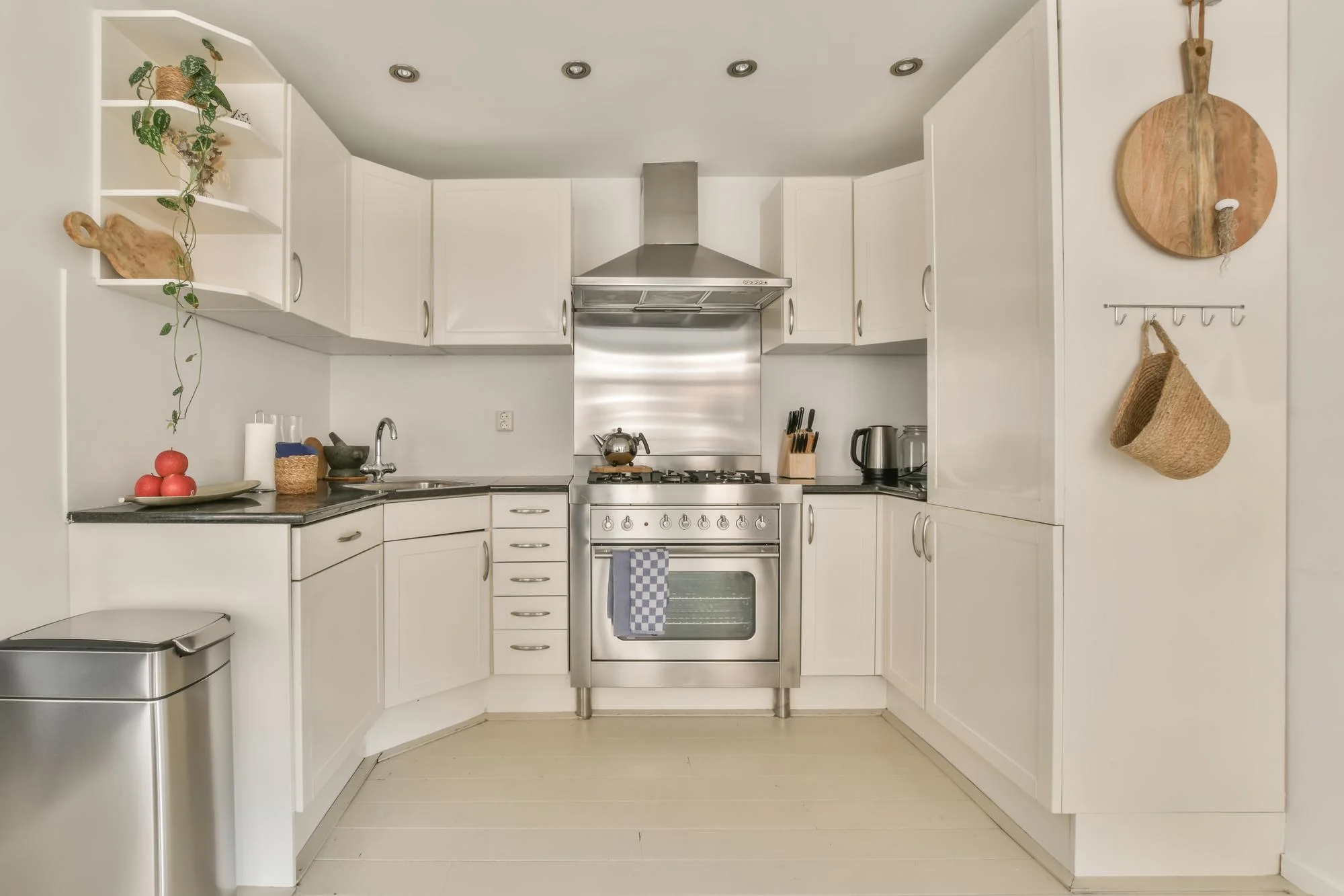 Classic U-shaped kitchen with stainless steel range