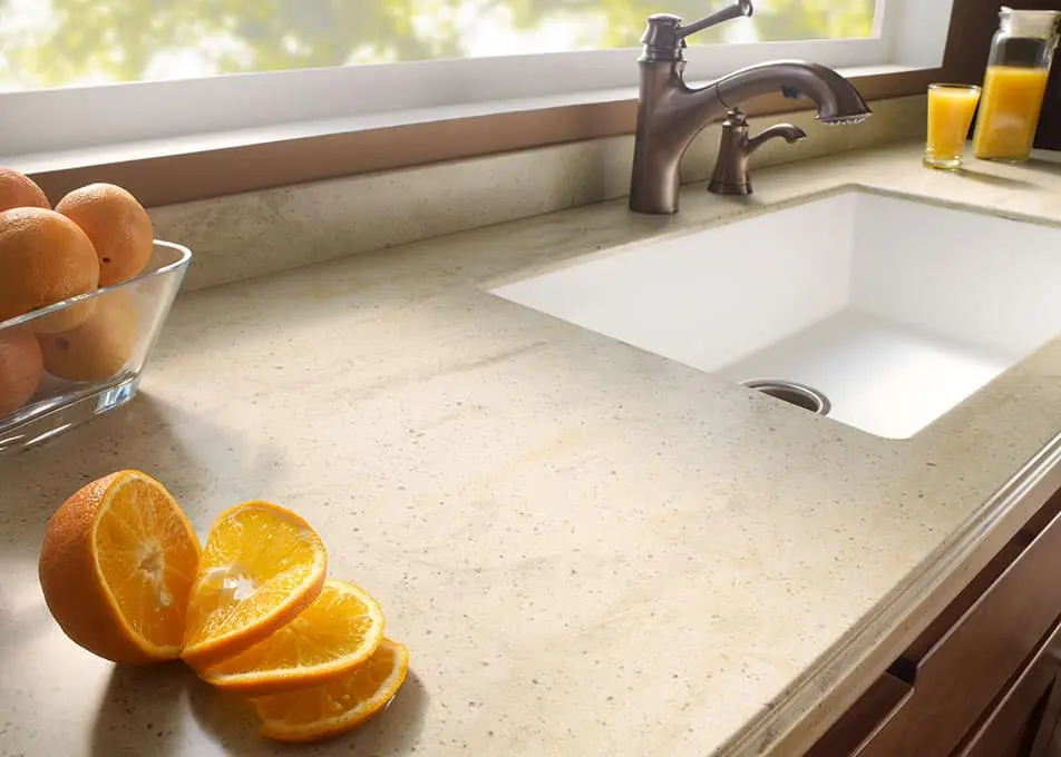 Light beige solid surface countertop with integrated sink