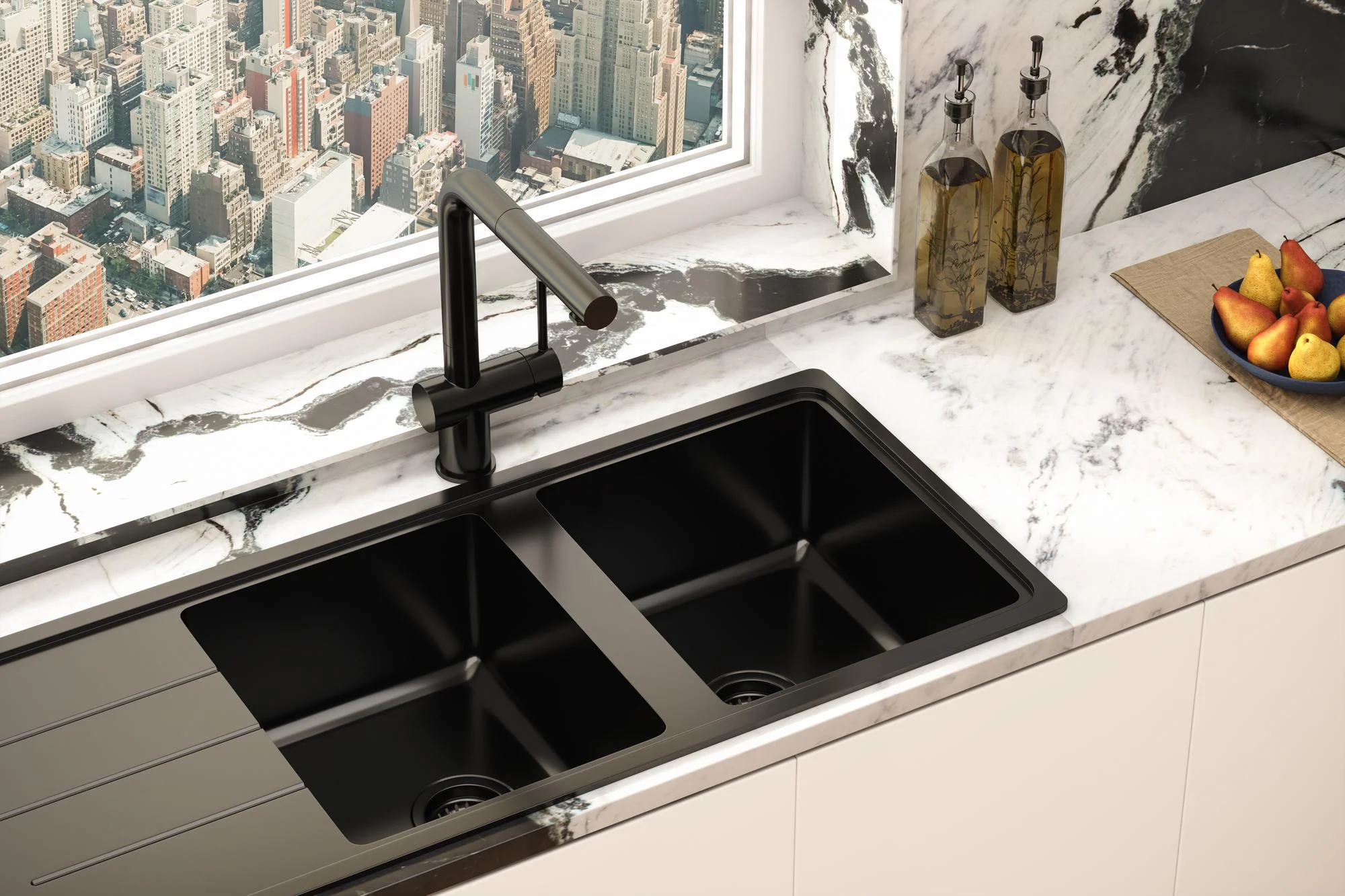 Black double drop in kitchen sink on marble counter