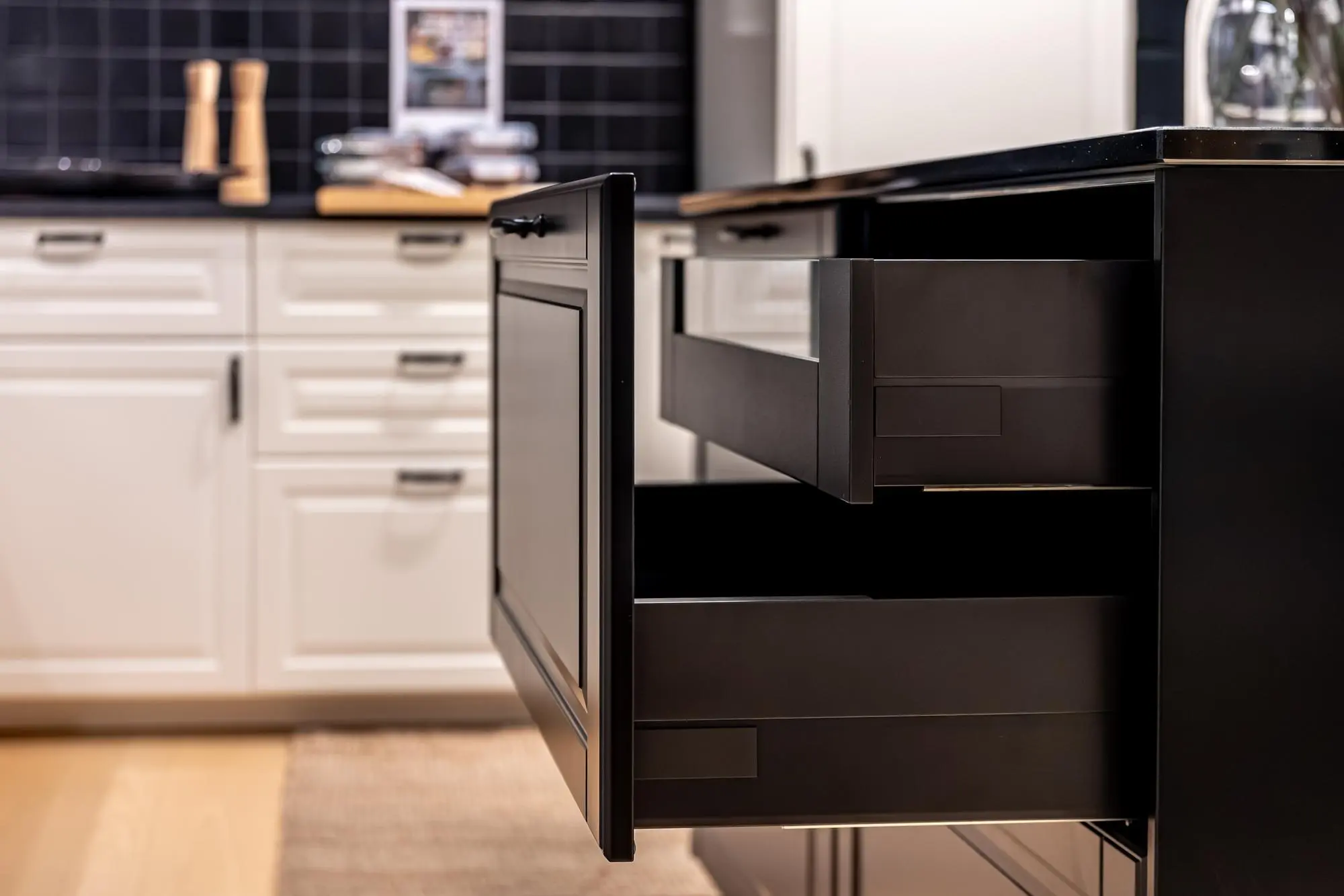 Black kitchen drawer system with modern pull out storage Black kitchen drawer system with modern pull out storage