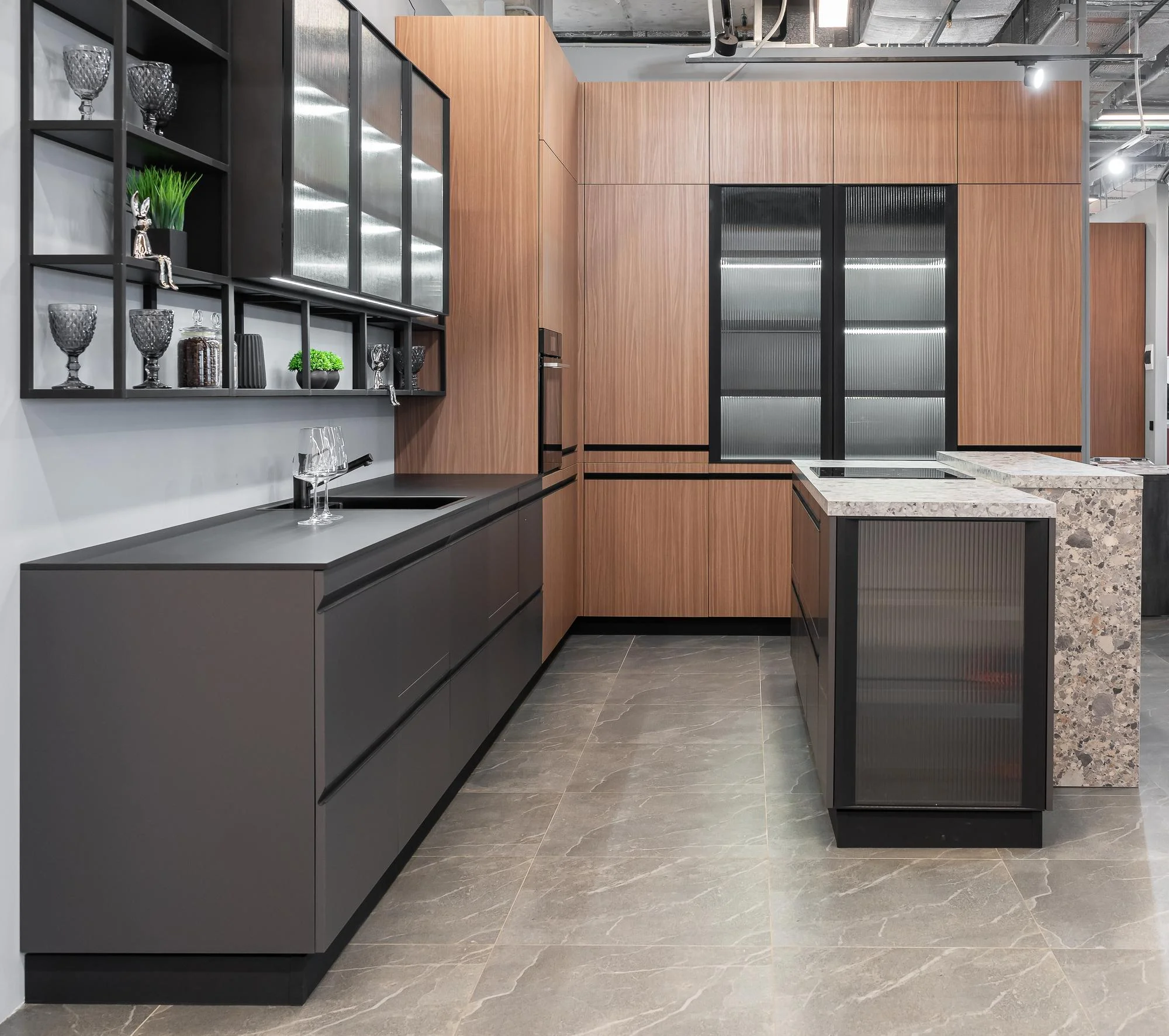 Modern kitchen with wood and black cabinets and island