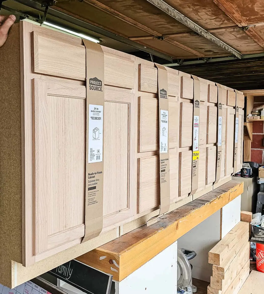 Prefab stock cabinets lined up for home installation
