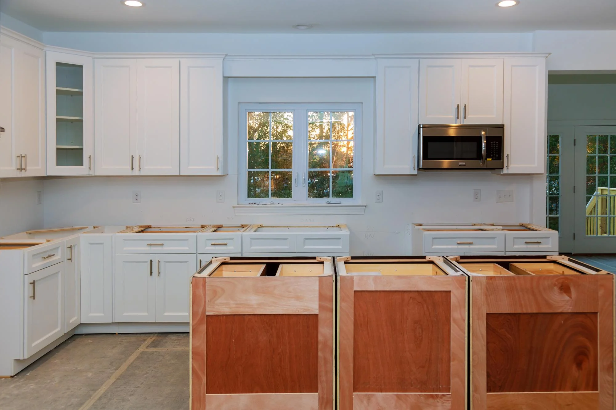 Stock white kitchen cabinets in a newly built home