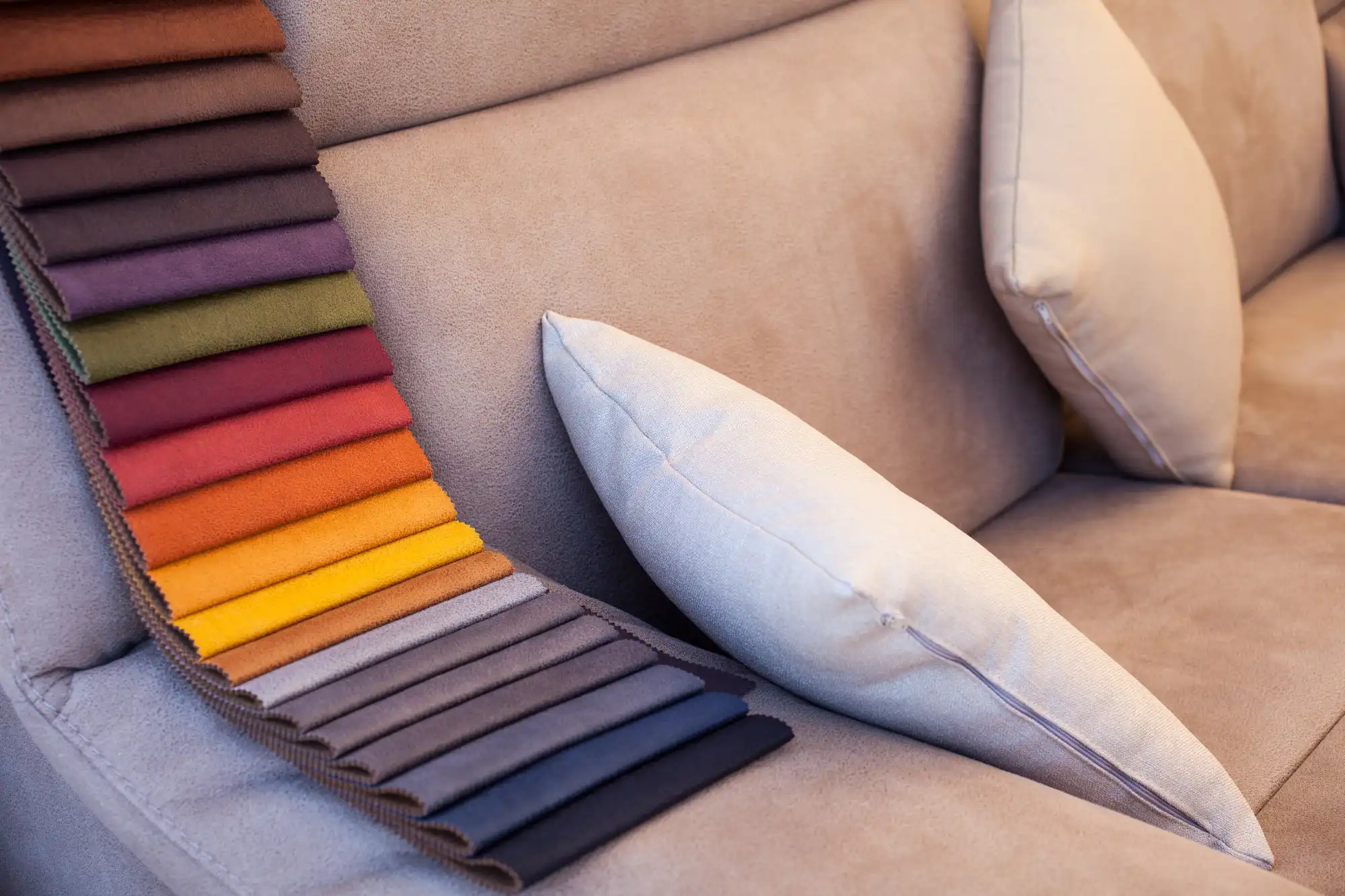 Fabric sofa with colorful upholstery samples displayed