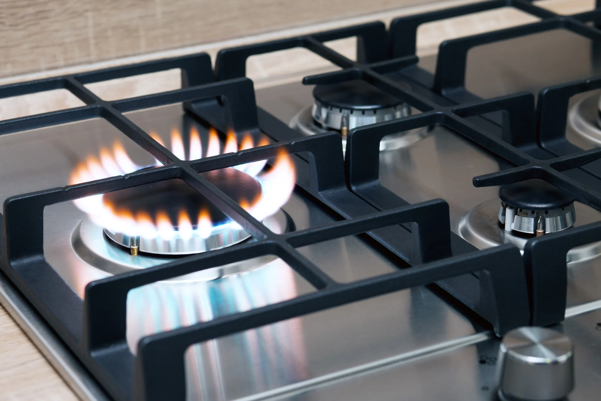 Gas smooth top stove heating pan for cooking