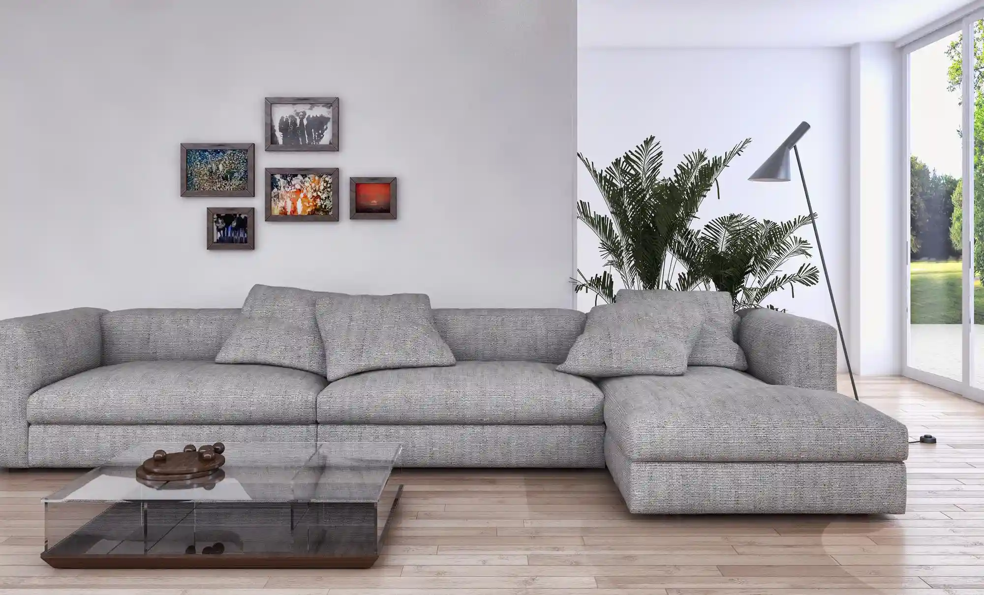 Modern living room with grey sectional sofa and wall art