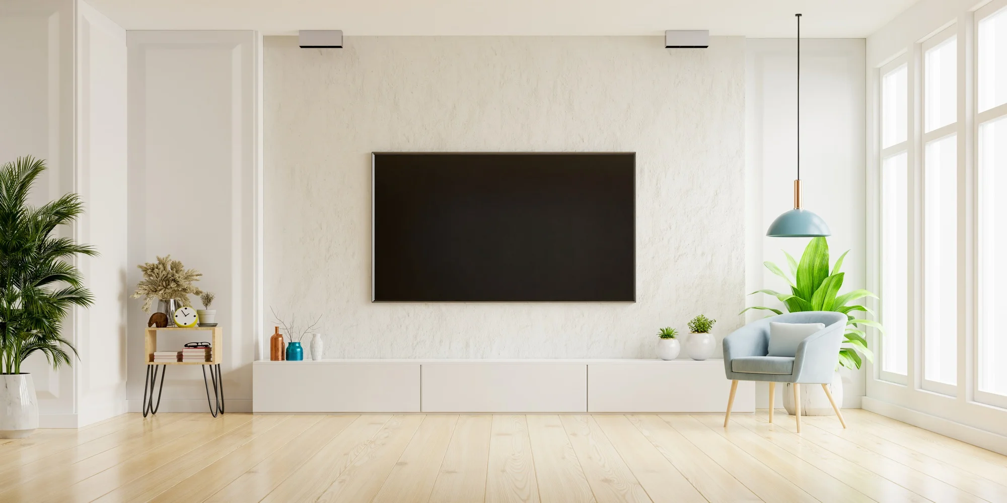 大型テレビとモダンな家具を備えた広々としたリビングルーム 大型テレビとモダンな家具を備えた広々としたリビングルーム