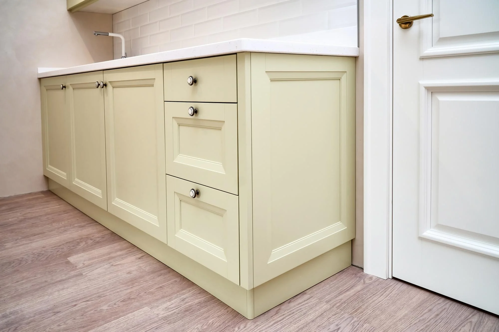 Traditional kitchen with cream raised panel cabinets