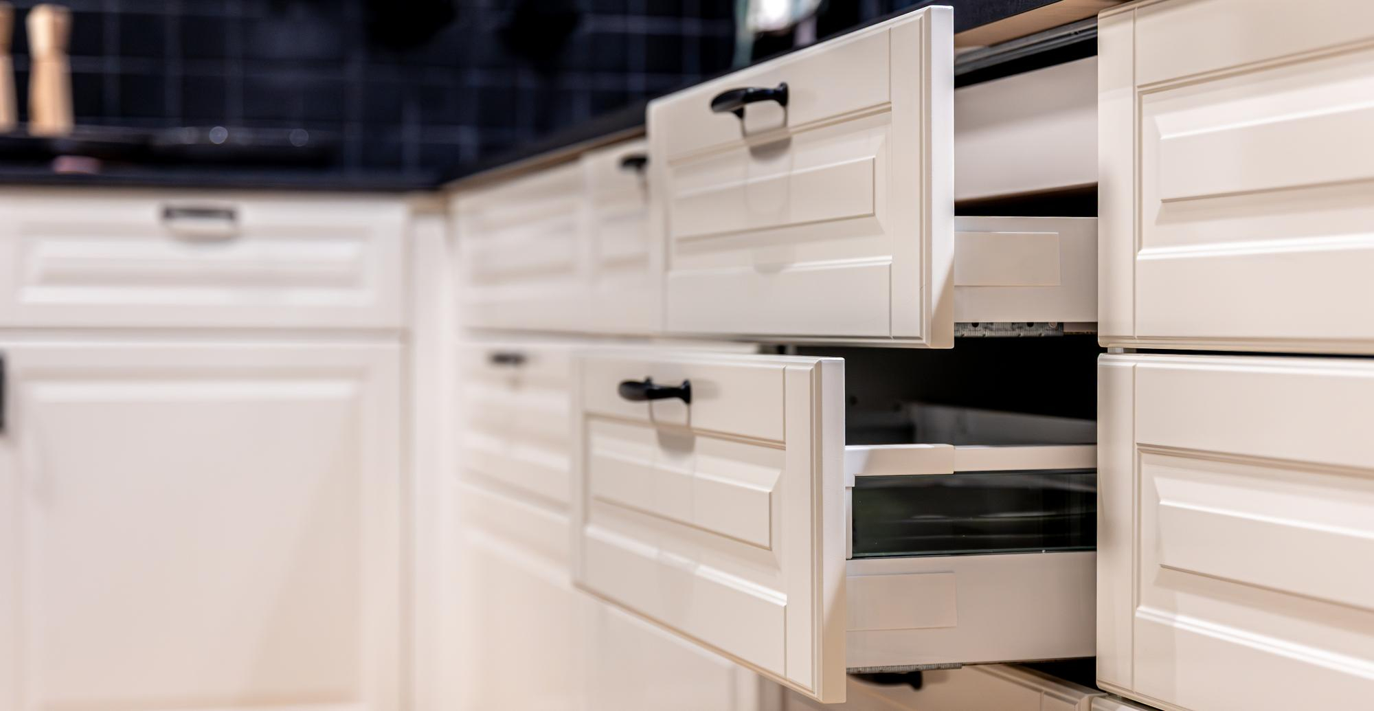 White drawer base cabinets with pull out storage