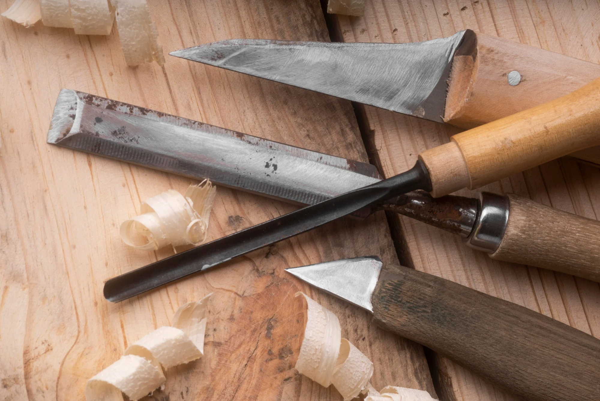 Carving knife with wood handles on table