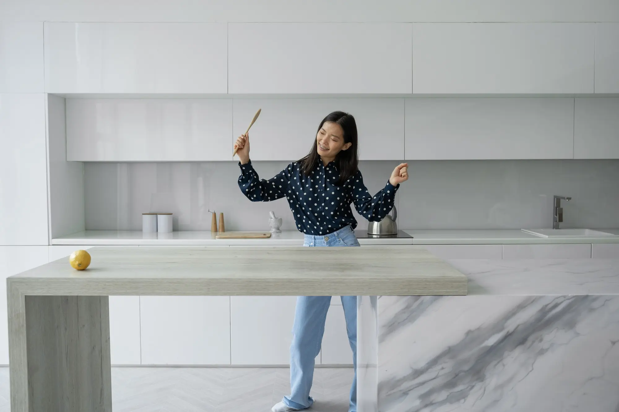 Minimalist kitchen island with extended countertop design