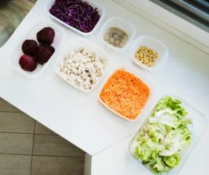 Prepped vegetables stored in containers for meal planning