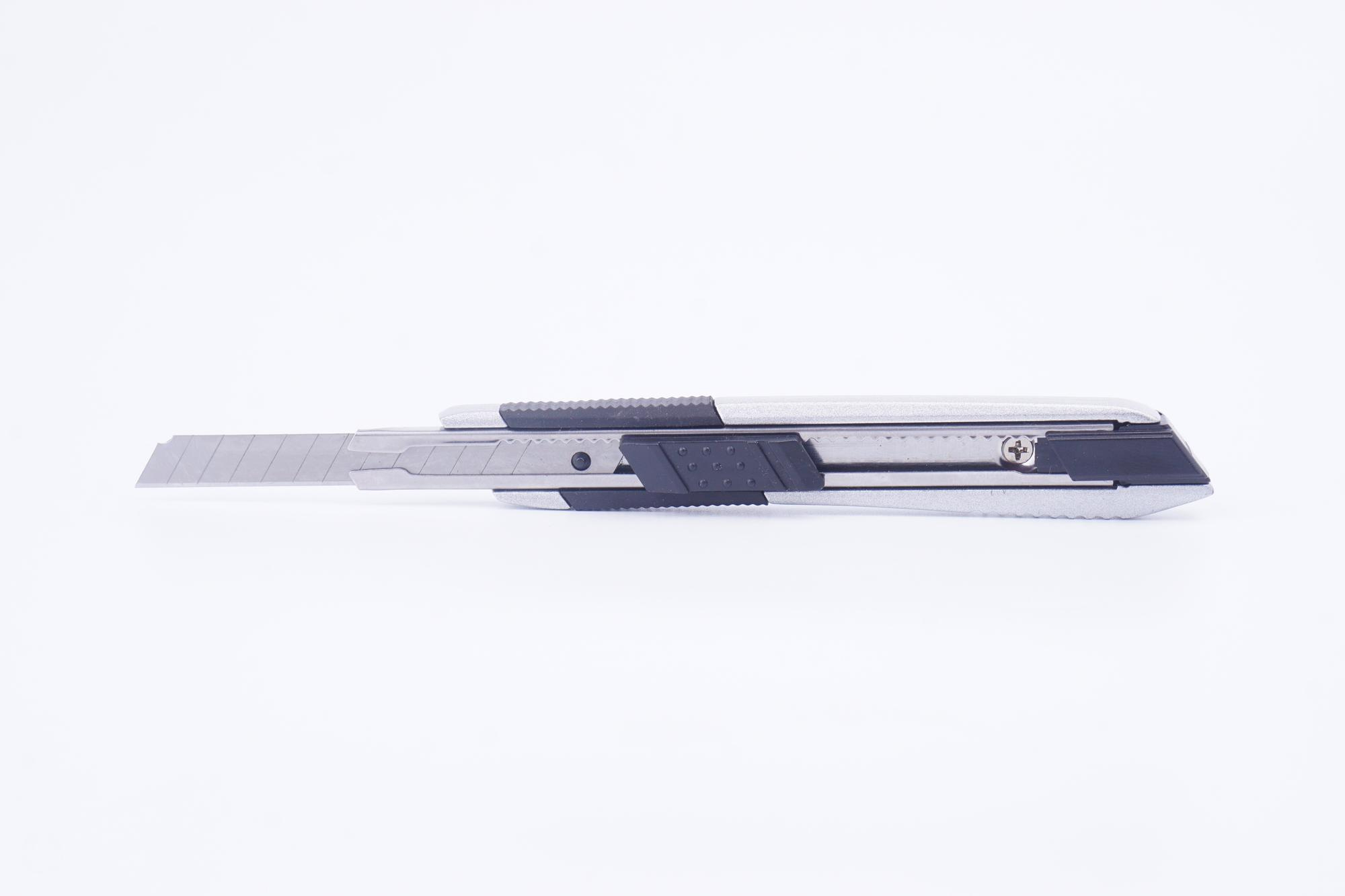 Utility knife isolated on white background
