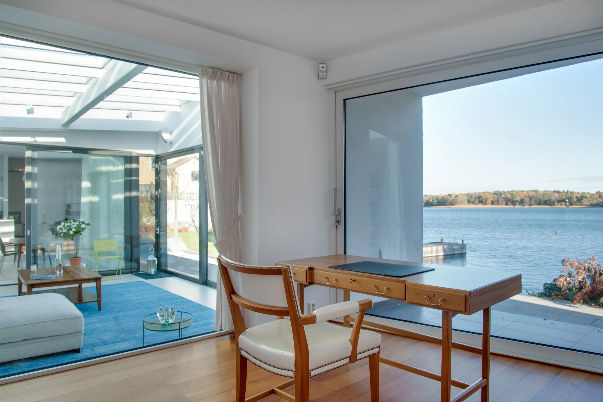 Coastal home window overlooking waterfront outdoor view