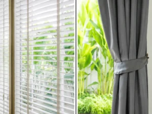 Gray curtains and white blinds beside large bright window