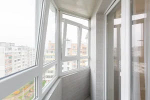 Modern balcony windows with white vinyl window frames