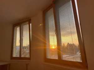Sunlight through energy efficient bedroom window blinds