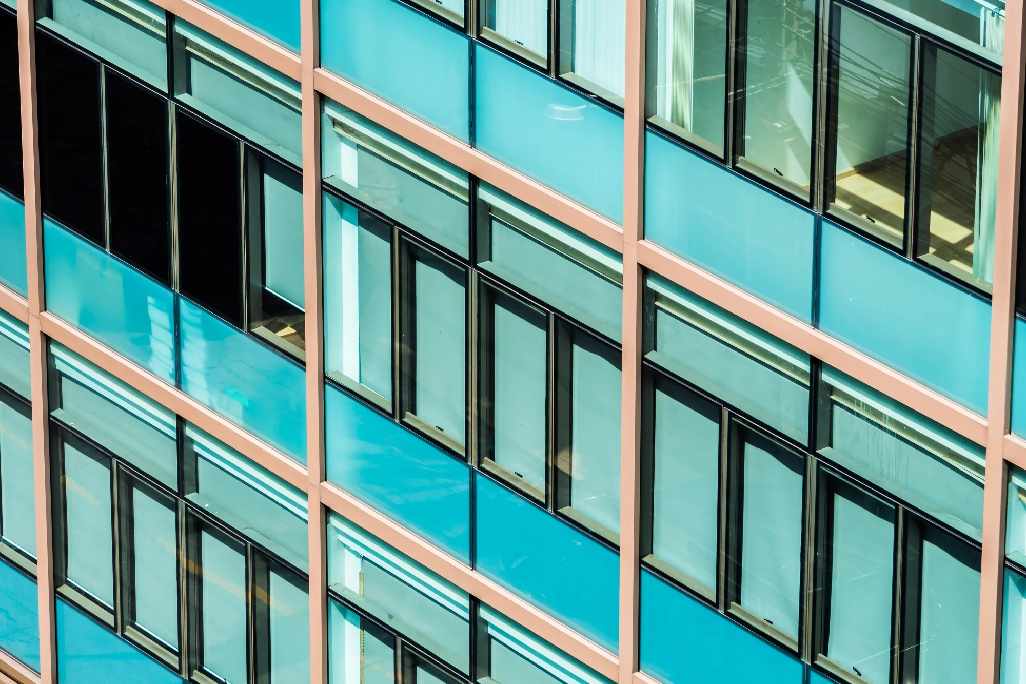 Tinted window glass facade for modern office buildings