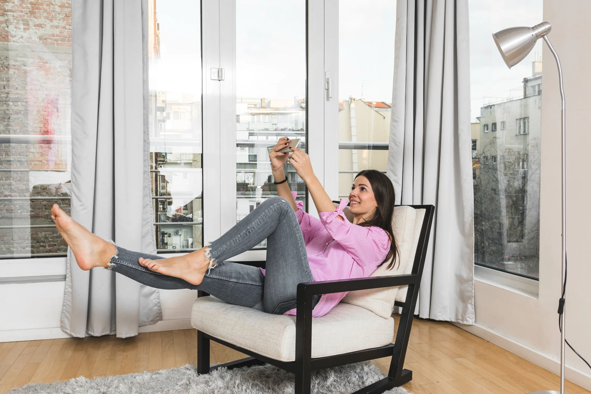 Living room casement windows with wide outdoor views Living room casement windows with wide outdoor views