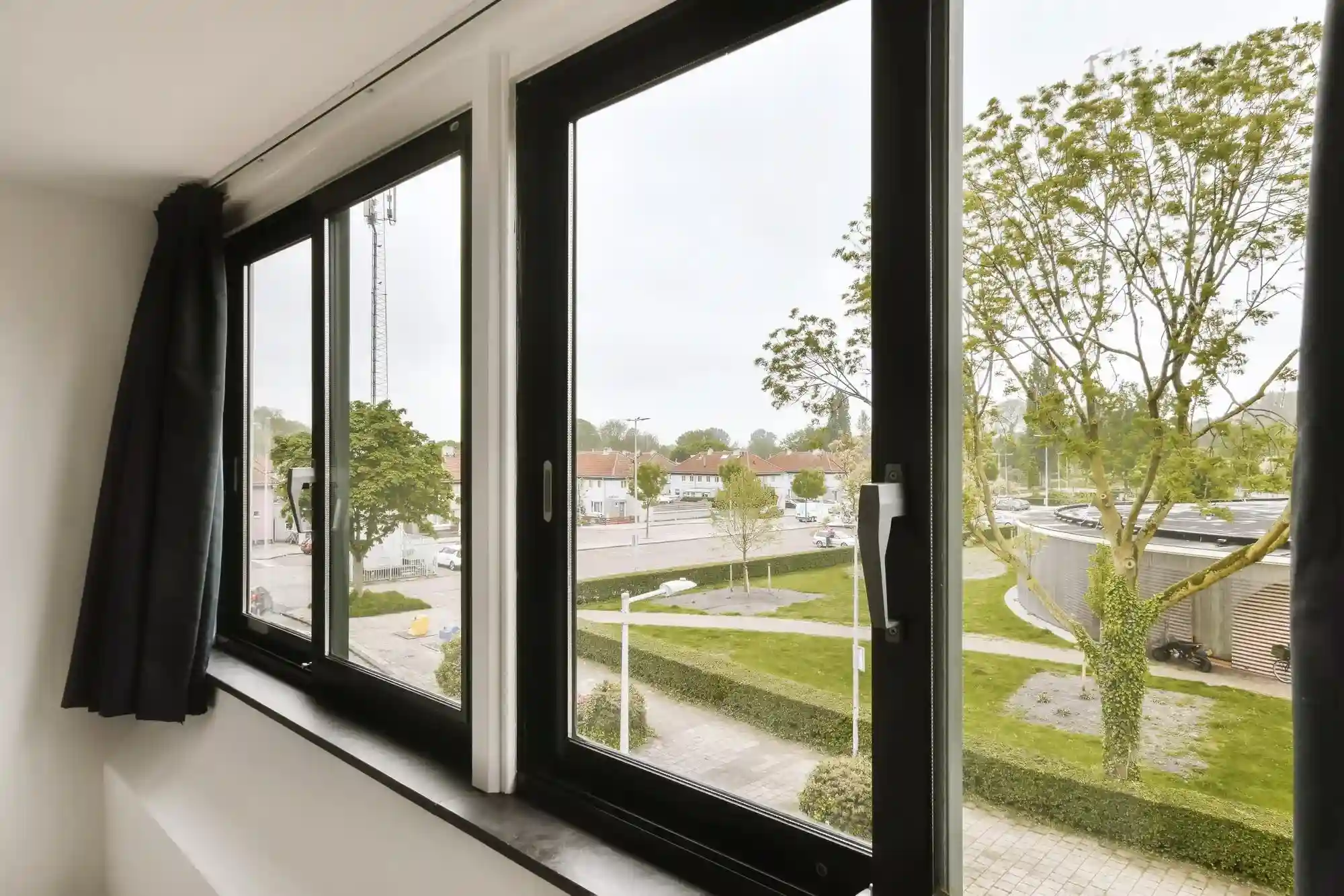 Modern black casement windows in contemporary home Modern black casement windows in contemporary home