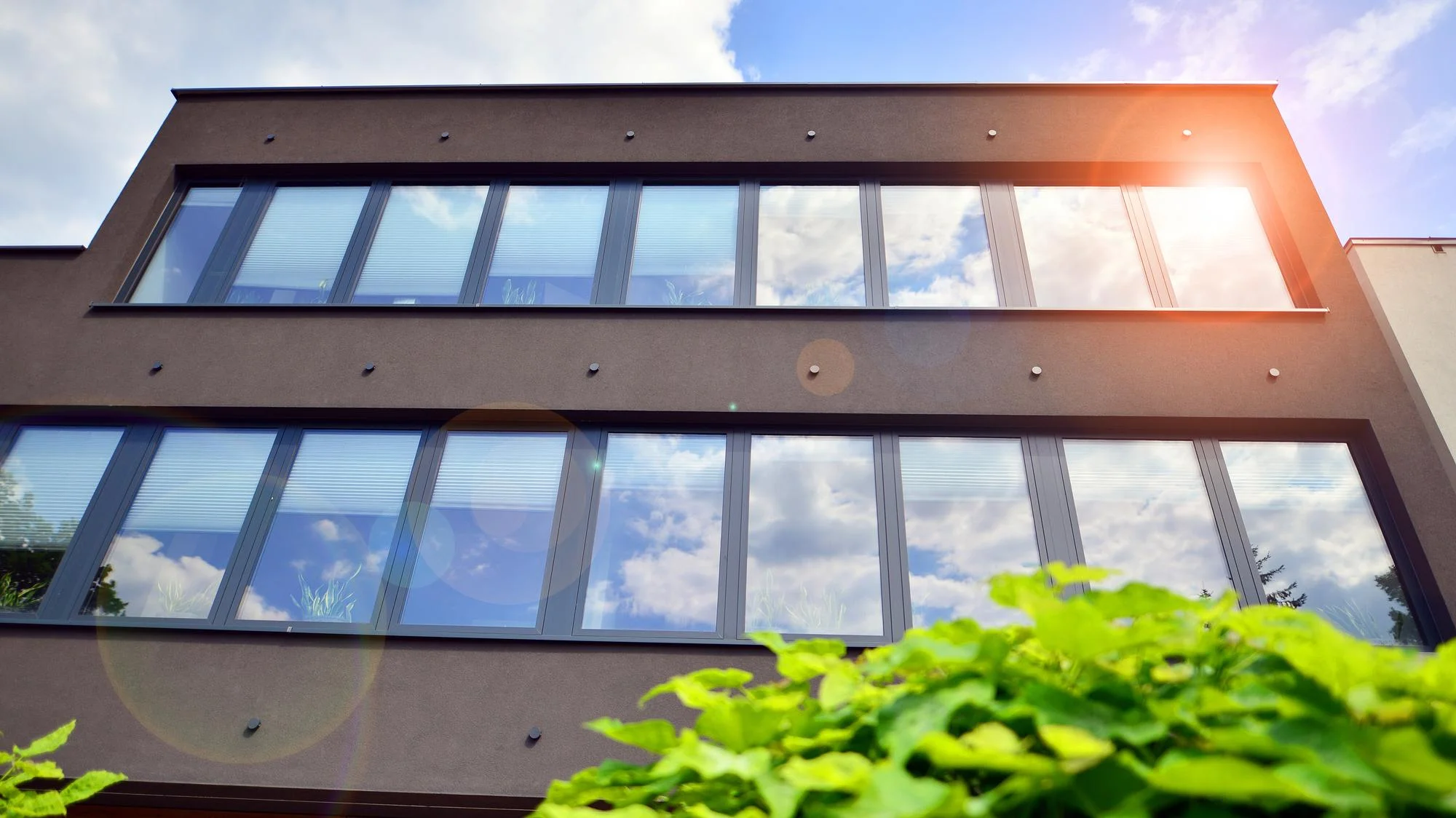Modern energy efficient windows on contemporary home Modern energy efficient windows on contemporary home